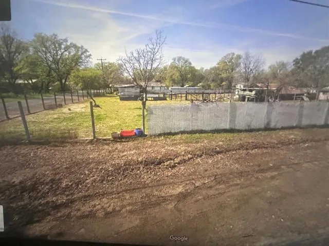 a view of lake with a swimming pool