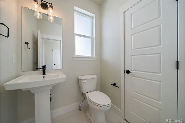 a view of balcony with wooden floor
