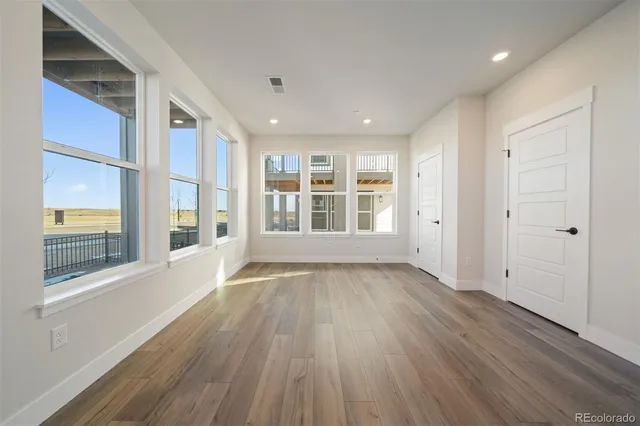 a bathroom with a double vanity sink mirror and shower