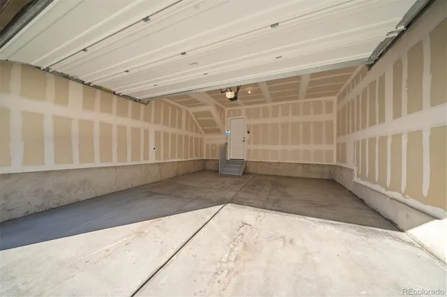 a view of the front of house with a street