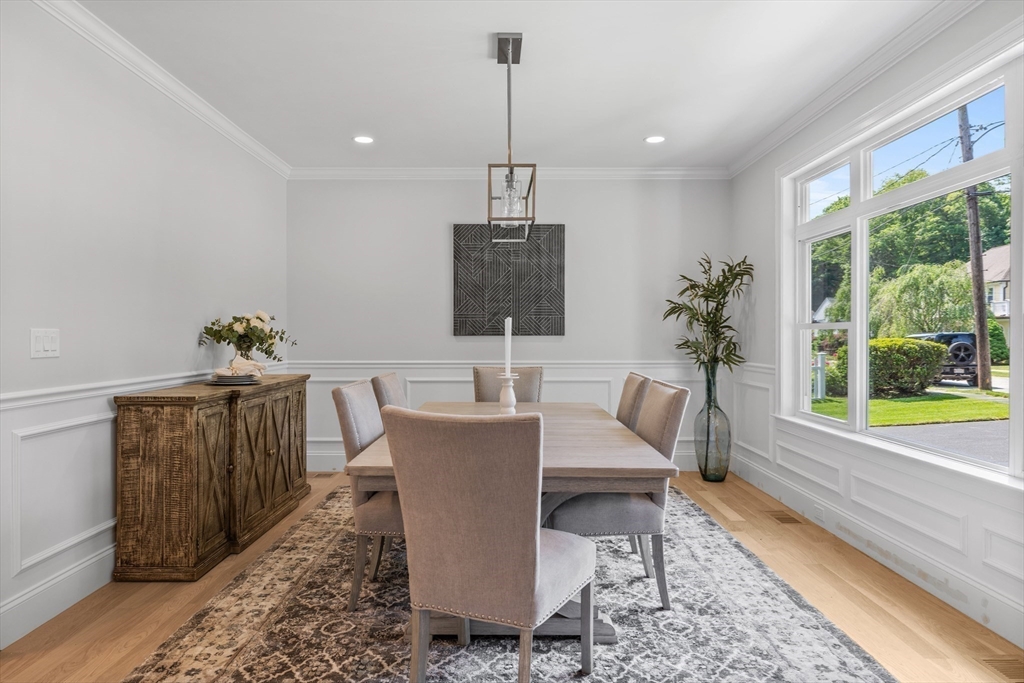 103 Wayne Road Needham, MA 02494 - Photo 13 of 29 a dining room with furniture window wooden floor