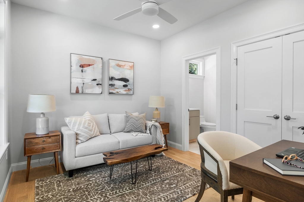 103 Wayne Road Needham, MA 02494 - Photo 14 of 29 a living room with furniture and a table