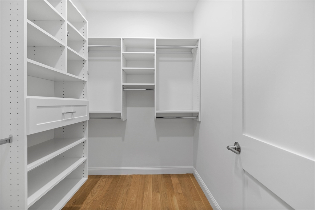 103 Wayne Road Needham, MA 02494 - Photo 17 of 29 a view of walk in closet with empty racks