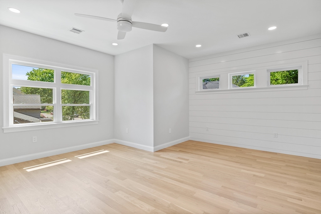 103 Wayne Road Needham, MA 02494 - Photo 19 of 29 a view of an empty room with a window
