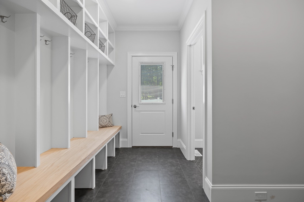 103 Wayne Road Needham, MA 02494 - Photo 21 of 29 a view of an entryway with staircase