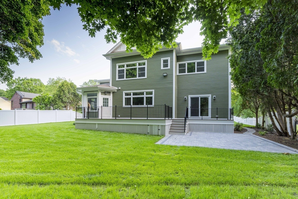103 Wayne Road Needham, MA 02494 - Photo 26 of 29 a view of a house with a yard and sitting area