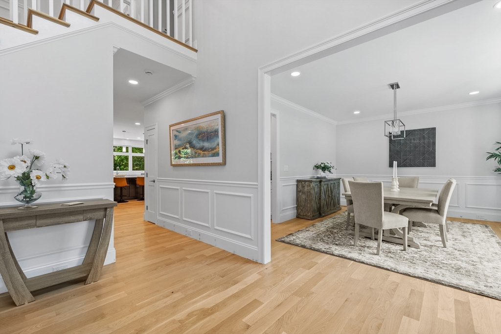 103 Wayne Road Needham, MA 02494 - Photo 3 of 29 a view of a kitchen with a sink and a fireplace