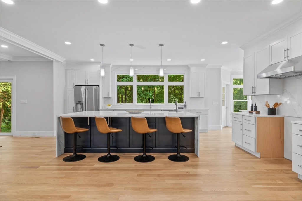 103 Wayne Road Needham, MA 02494 - Photo 4 of 29 a view of kitchen with windows and refrigerator