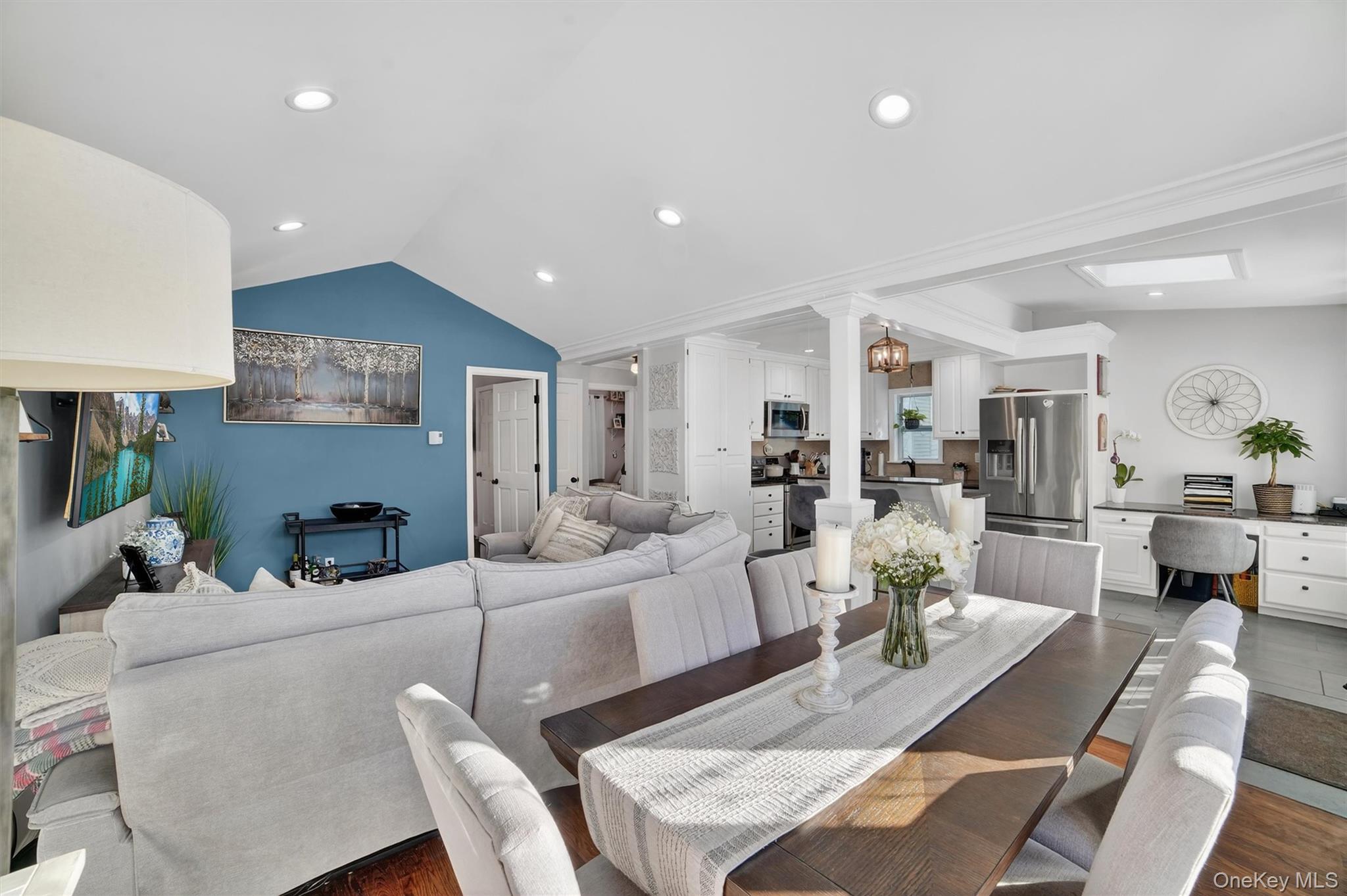 40 Orchard Road Putnam Valley, NY 10579 - Photo 6 of 19 a living room with furniture a wooden floor and a large window