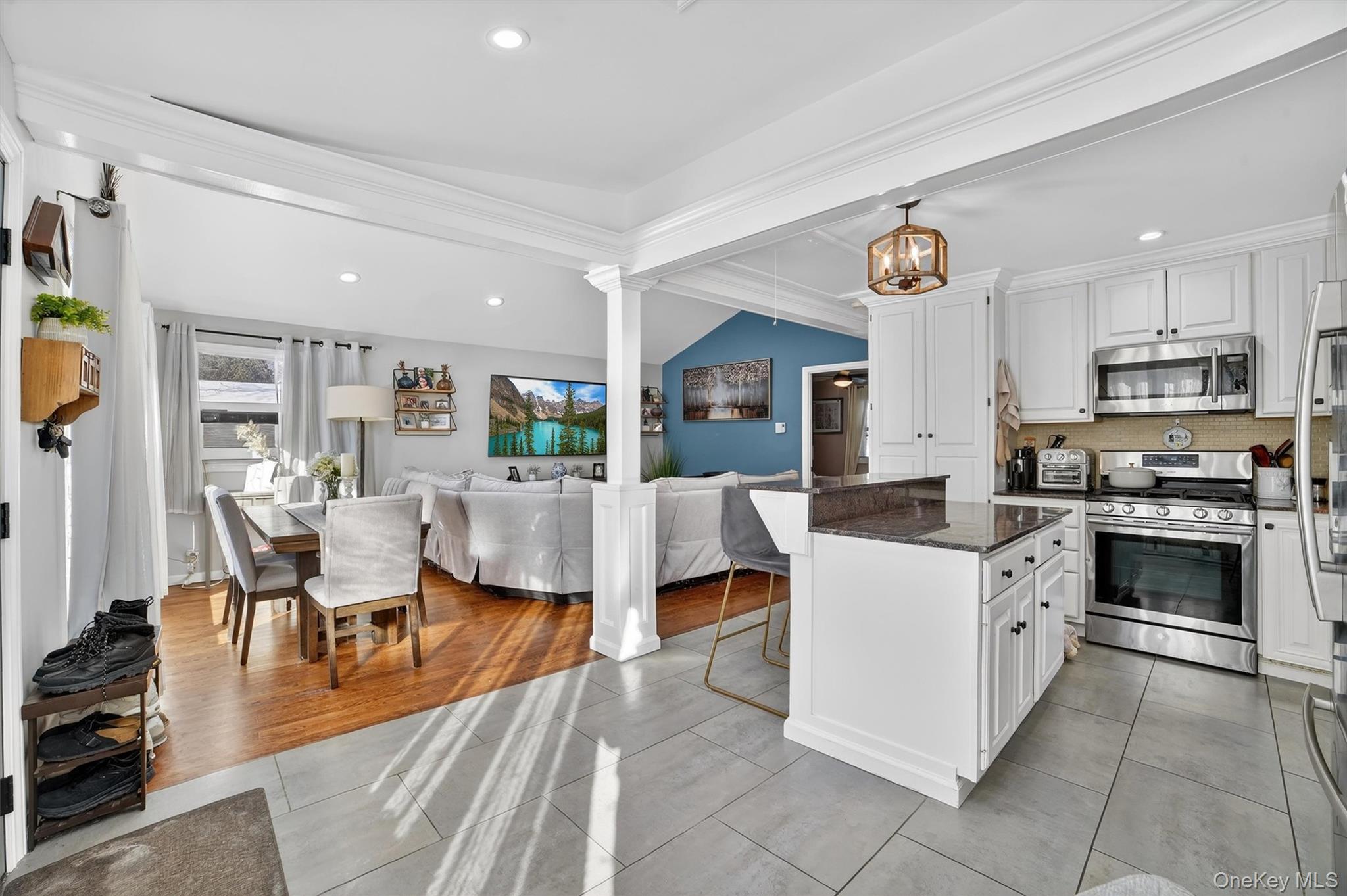 40 Orchard Road Putnam Valley, NY 10579 - Photo 10 of 19 a living room with stainless steel appliances furniture and a kitchen view