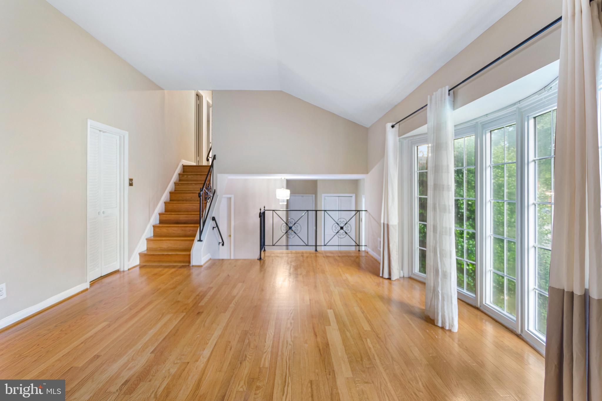 6503 Friars Court Bethesda, MD 20817 - Photo 11 of 48 a view of empty room with wooden floor
