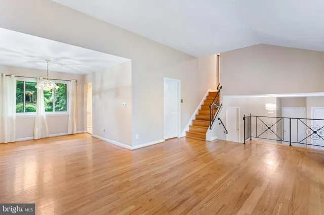 a view of an entryway with wooden floor