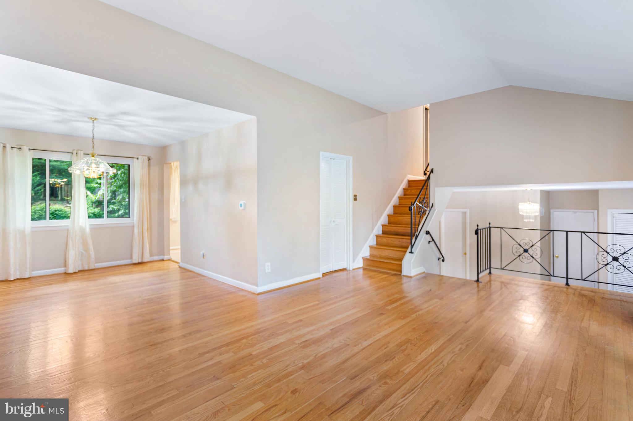 6503 Friars Court Bethesda, MD 20817 - Photo 12 of 48 a view of an entryway with wooden floor
