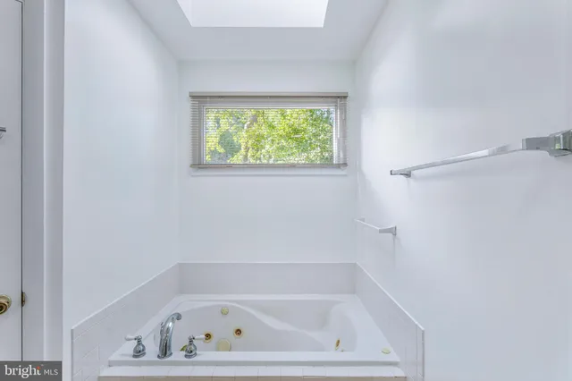 a bathroom with a bathtub