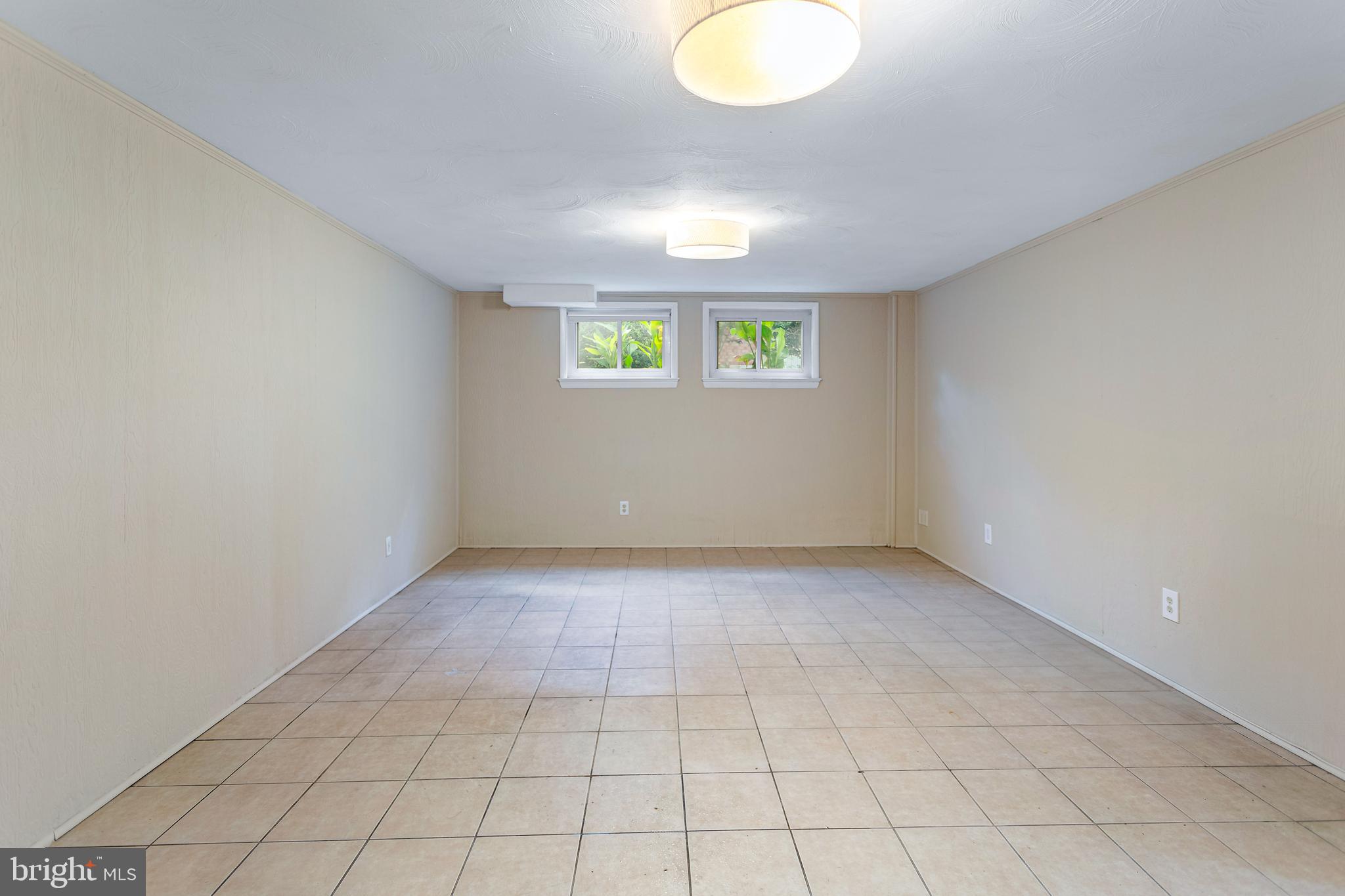 6503 Friars Court Bethesda, MD 20817 - Photo 36 of 48 a view of an empty room with a window
