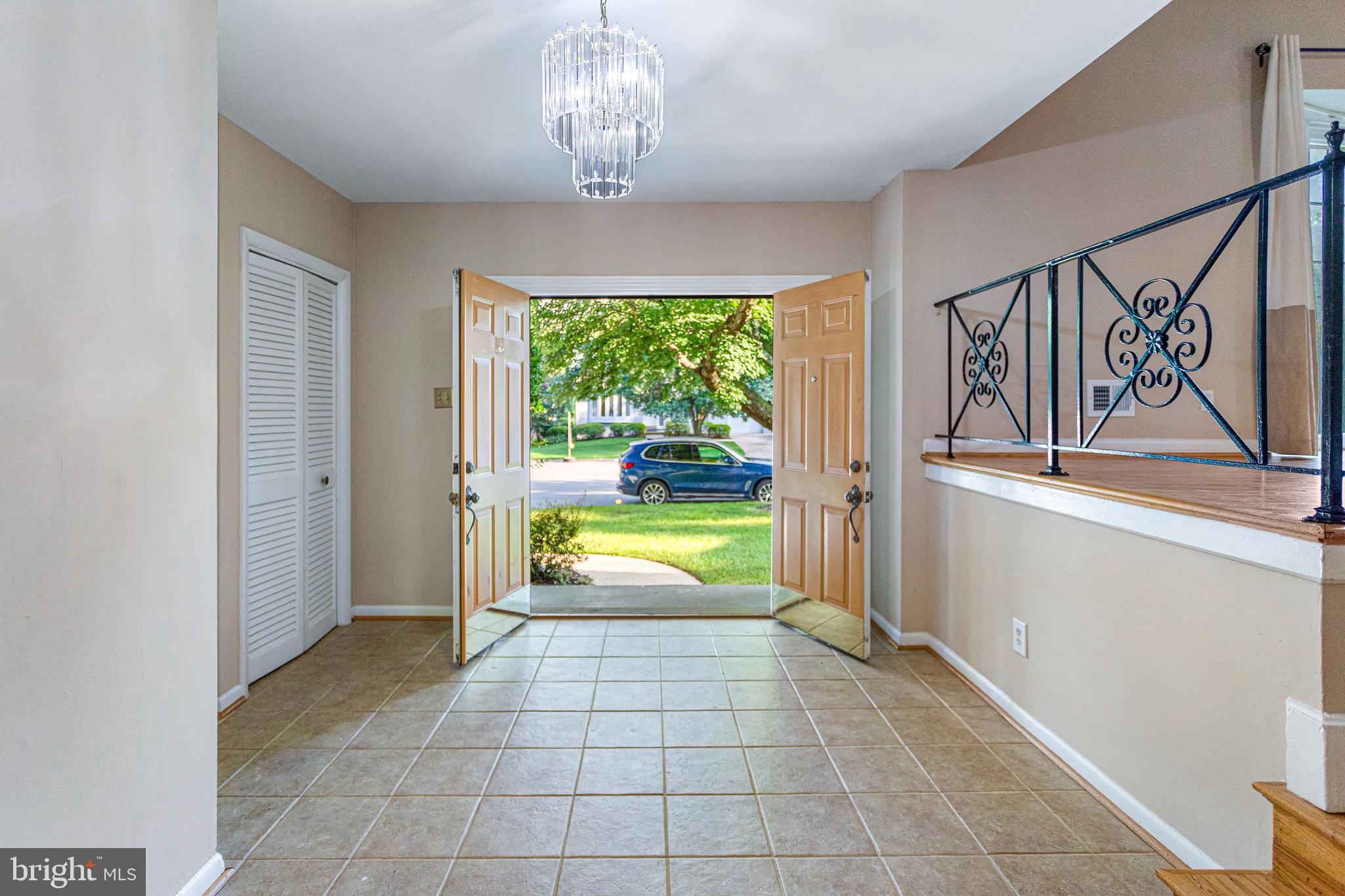 6503 Friars Court Bethesda, MD 20817 - Photo 5 of 48 a view of an entryway with a garden
