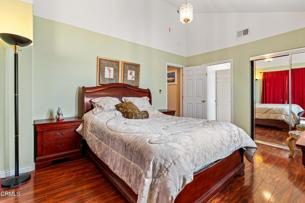 907 West Mission Road, Unit B Alhambra, CA 91801 - Photo 18 of 27 a bedroom with bed and wooden floor