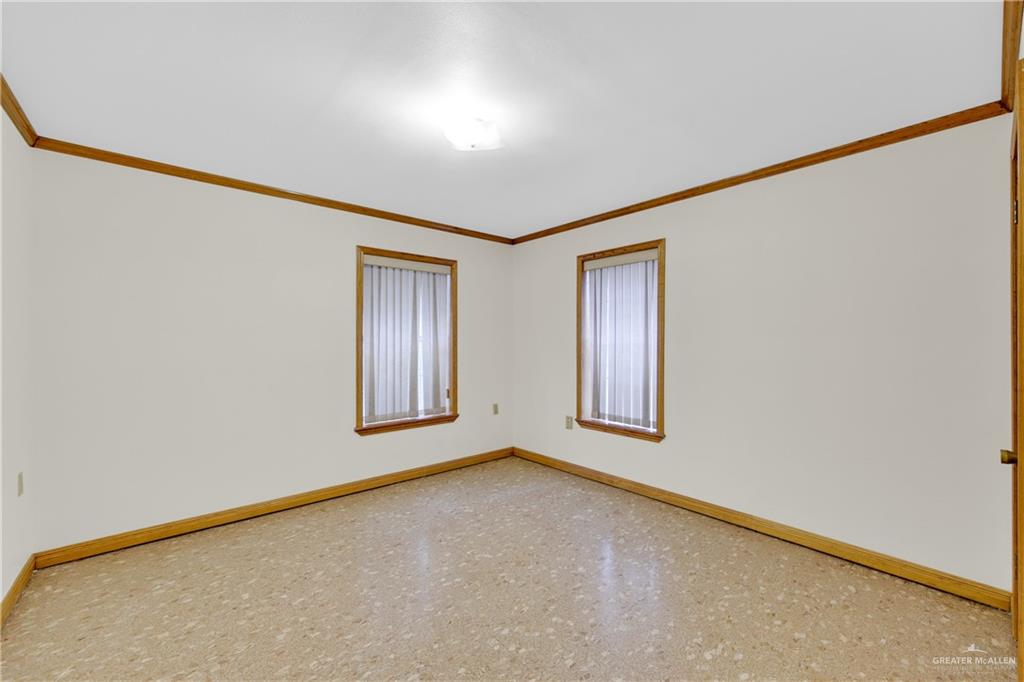 18 Bellas Lane Rio Grande City, TX 78582 - Photo 13 of 28 a view of an empty room with windows