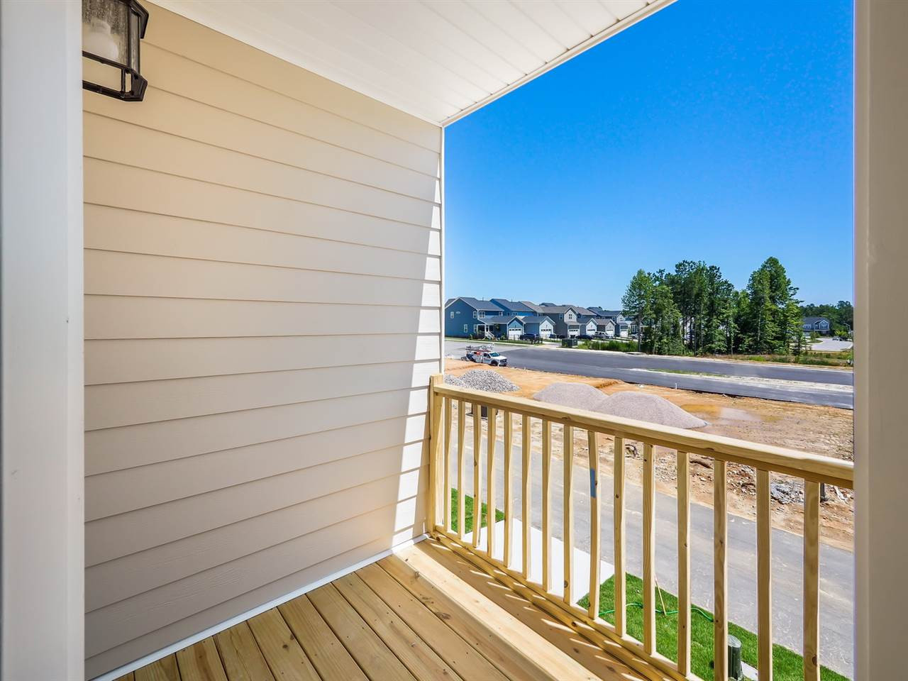 4903 Southern Magnolia Drive, Unit 65 Raleigh, NC 27604 - Photo 24 of 30 Model home in another community. Illustrative purposes only. Covered Porch