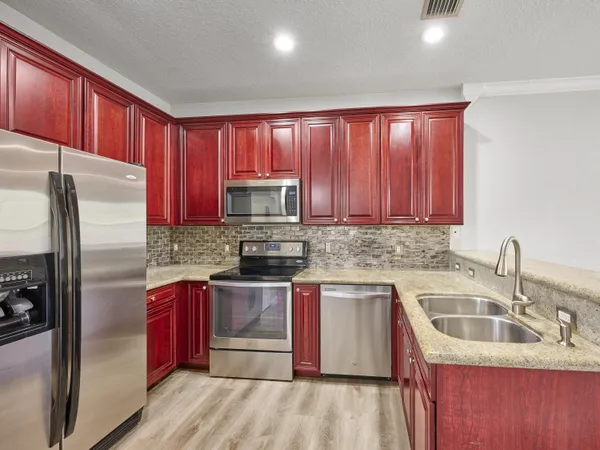 $399,000 | 105 East Pigeon Plum Drive, Unit 103, Jupiter, FL 33458