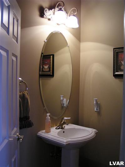 778 Lahr Road Nazareth, PA 18064 - Photo 34 of 36 a bathroom with a sink and mirror