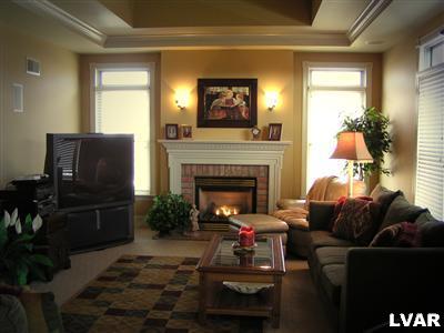 778 Lahr Road Nazareth, PA 18064 - Photo 6 of 36 a living room with furniture and a fireplace