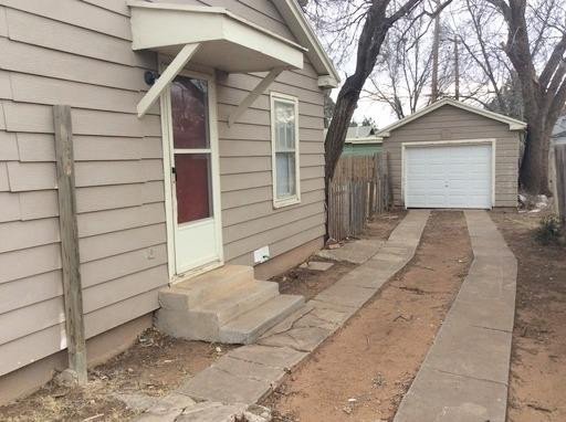 3405 24th Street Lubbock, TX 79410 - Photo 10 of 11 a view of entrance gate of a house