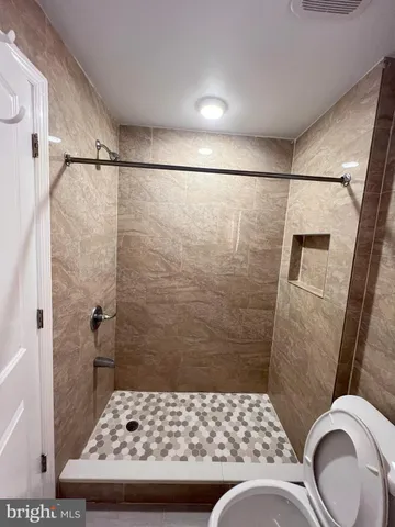 a bathroom with a sink and a shower
