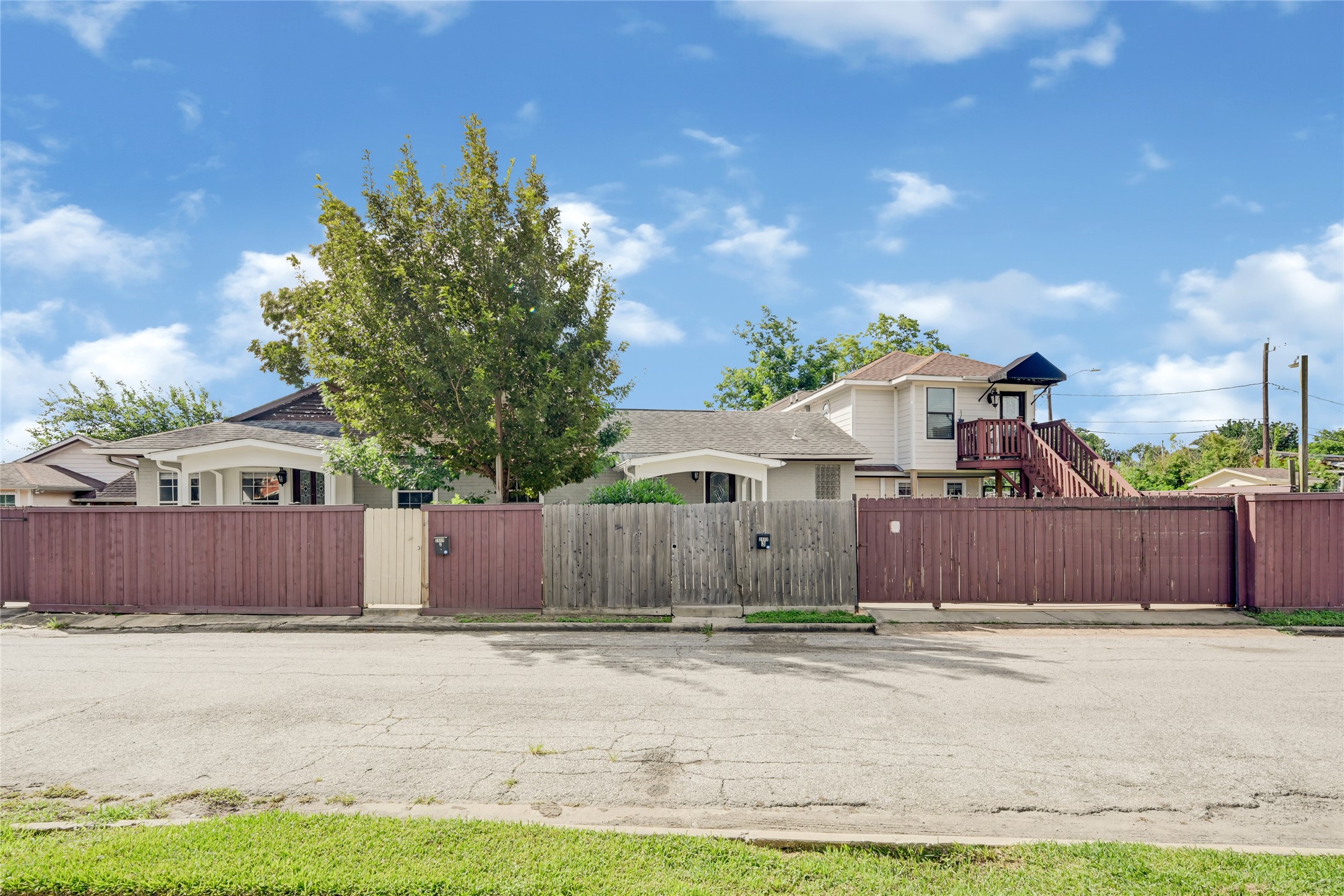 2809 Tooke Street Houston, TX 77023 - Photo 46 of 50 a front view of a house with a yard and garage