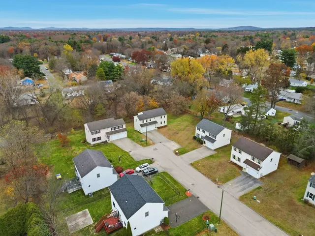 an aerial view of a house with a outdoor space