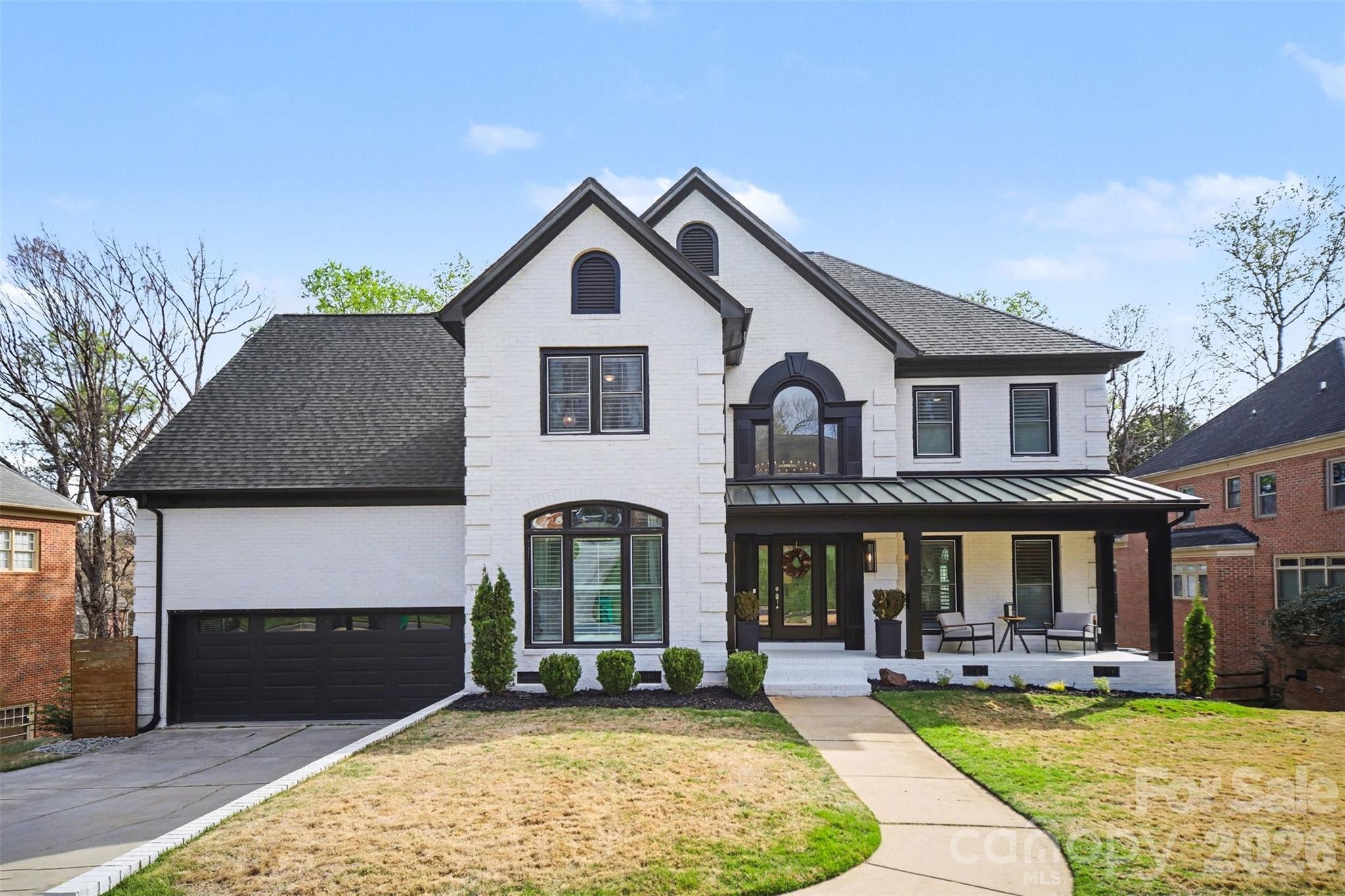 6008 Alexa Road Charlotte, NC 28277 - Photo 1 of 46 a front view of a house with yard