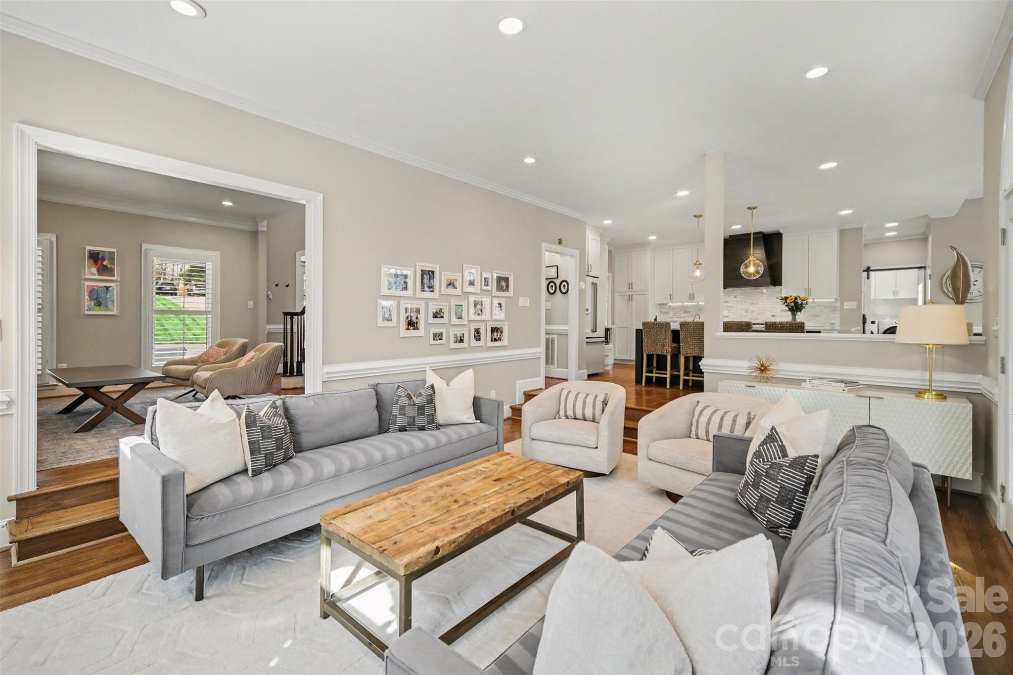 6008 Alexa Road Charlotte, NC 28277 - Photo 14 of 46 a living room with furniture and a flat screen tv