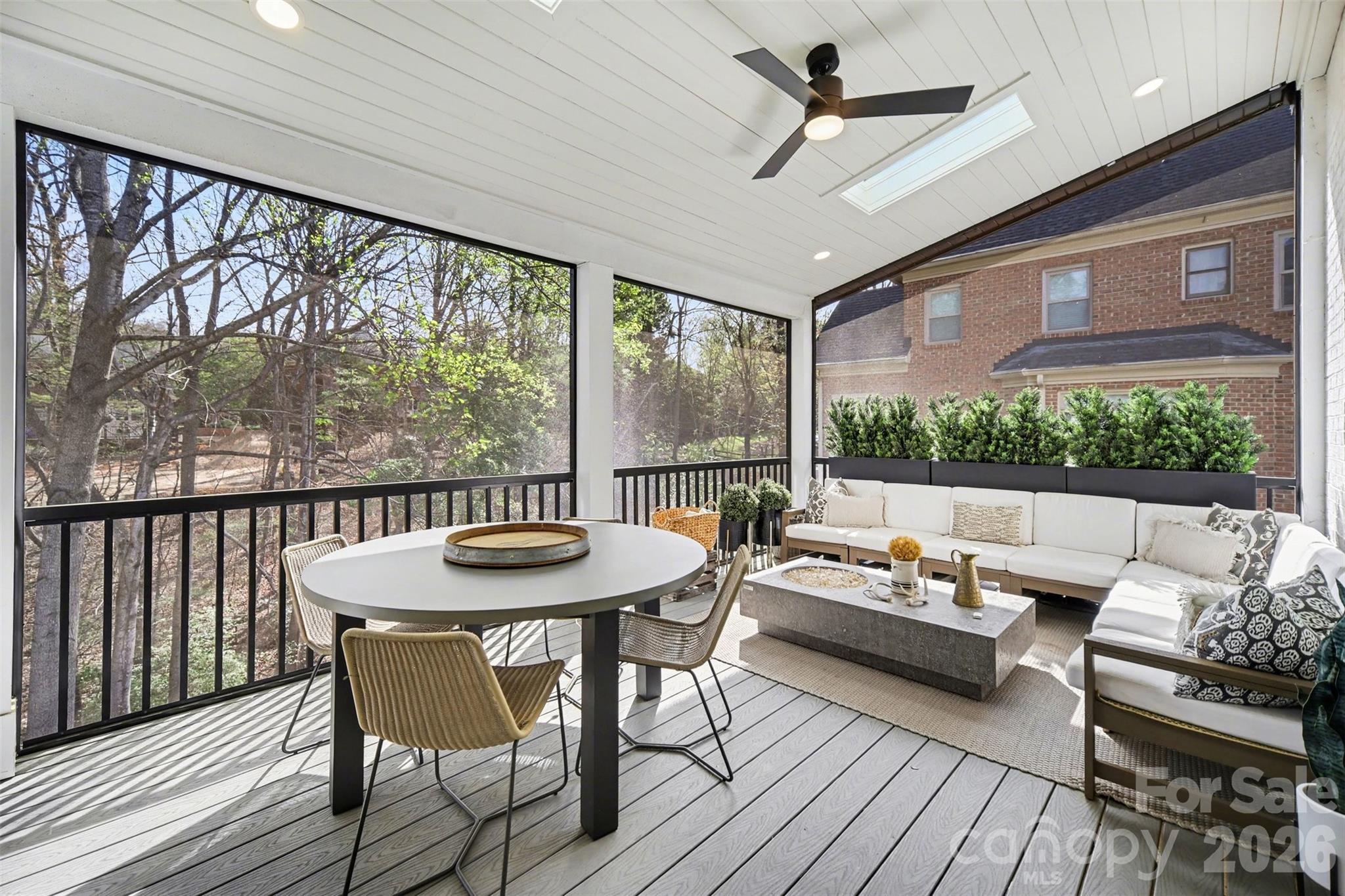 6008 Alexa Road Charlotte, NC 28277 - Photo 17 of 46 a living room with furniture and a floor to ceiling window