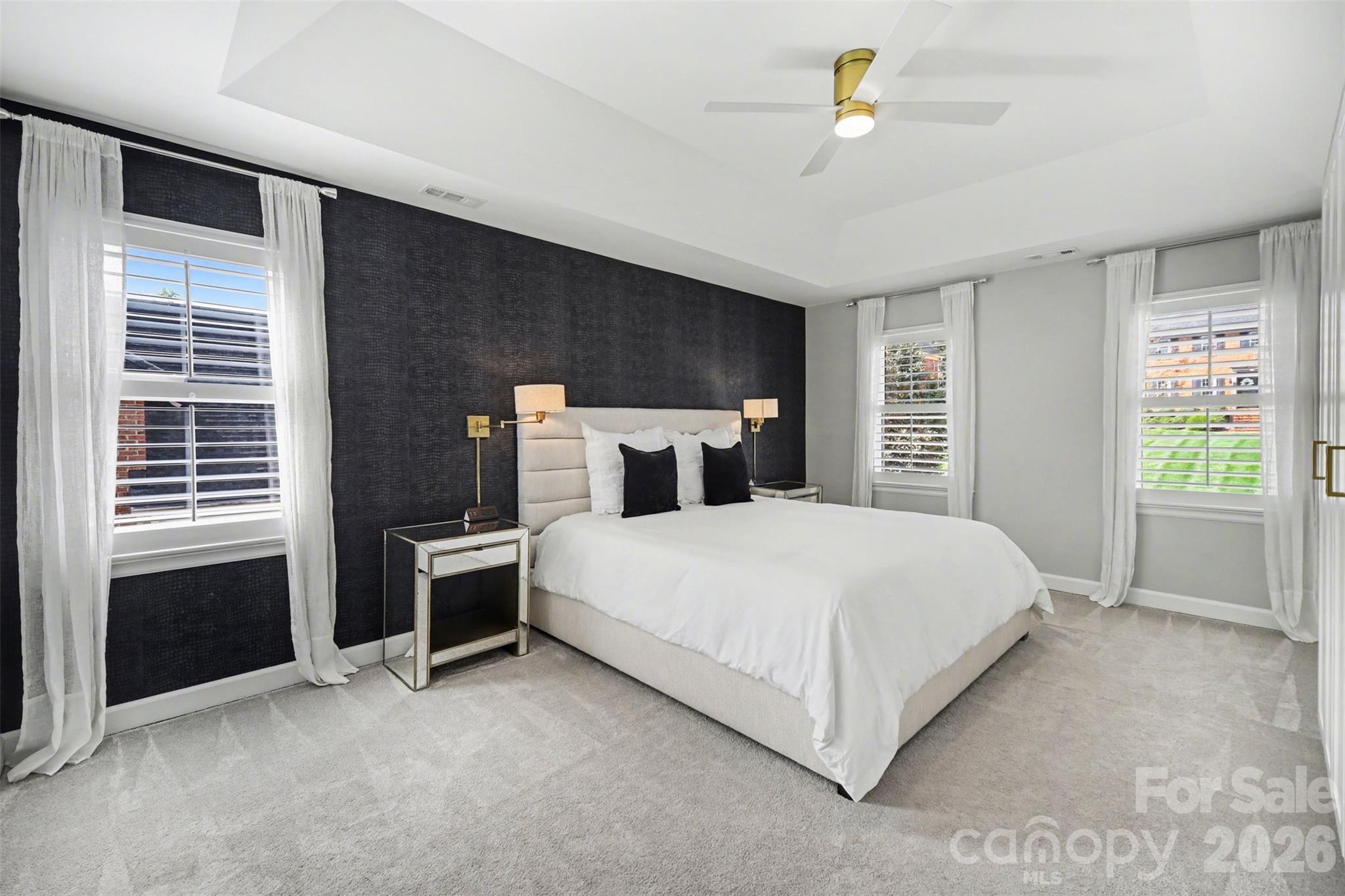 6008 Alexa Road Charlotte, NC 28277 - Photo 19 of 46 a bedroom with a bed lamp and a window
