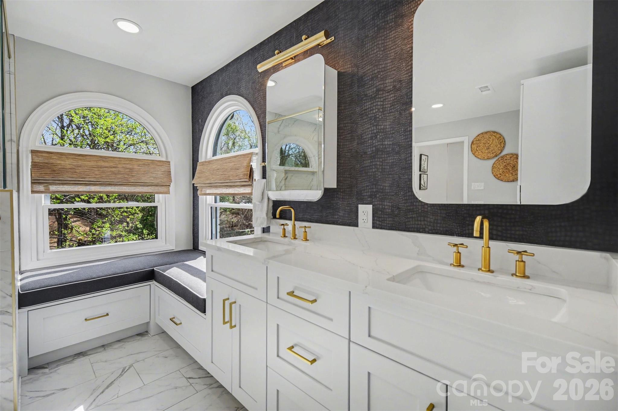 6008 Alexa Road Charlotte, NC 28277 - Photo 22 of 46 a bathroom with a sink and a large mirror