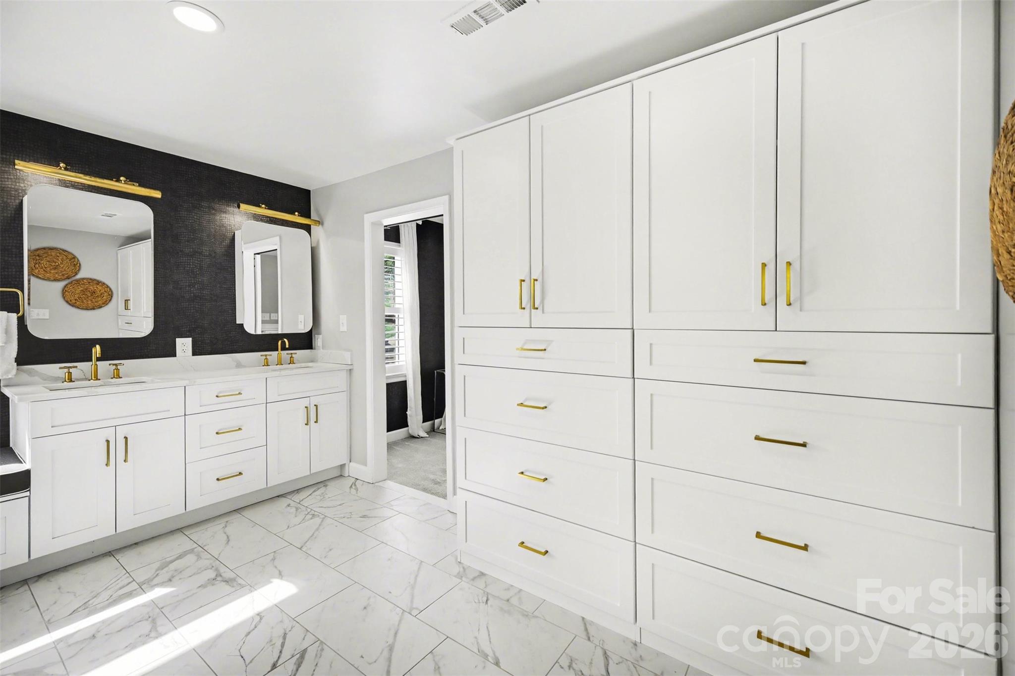 6008 Alexa Road Charlotte, NC 28277 - Photo 24 of 46 a view of a dresser and mirror