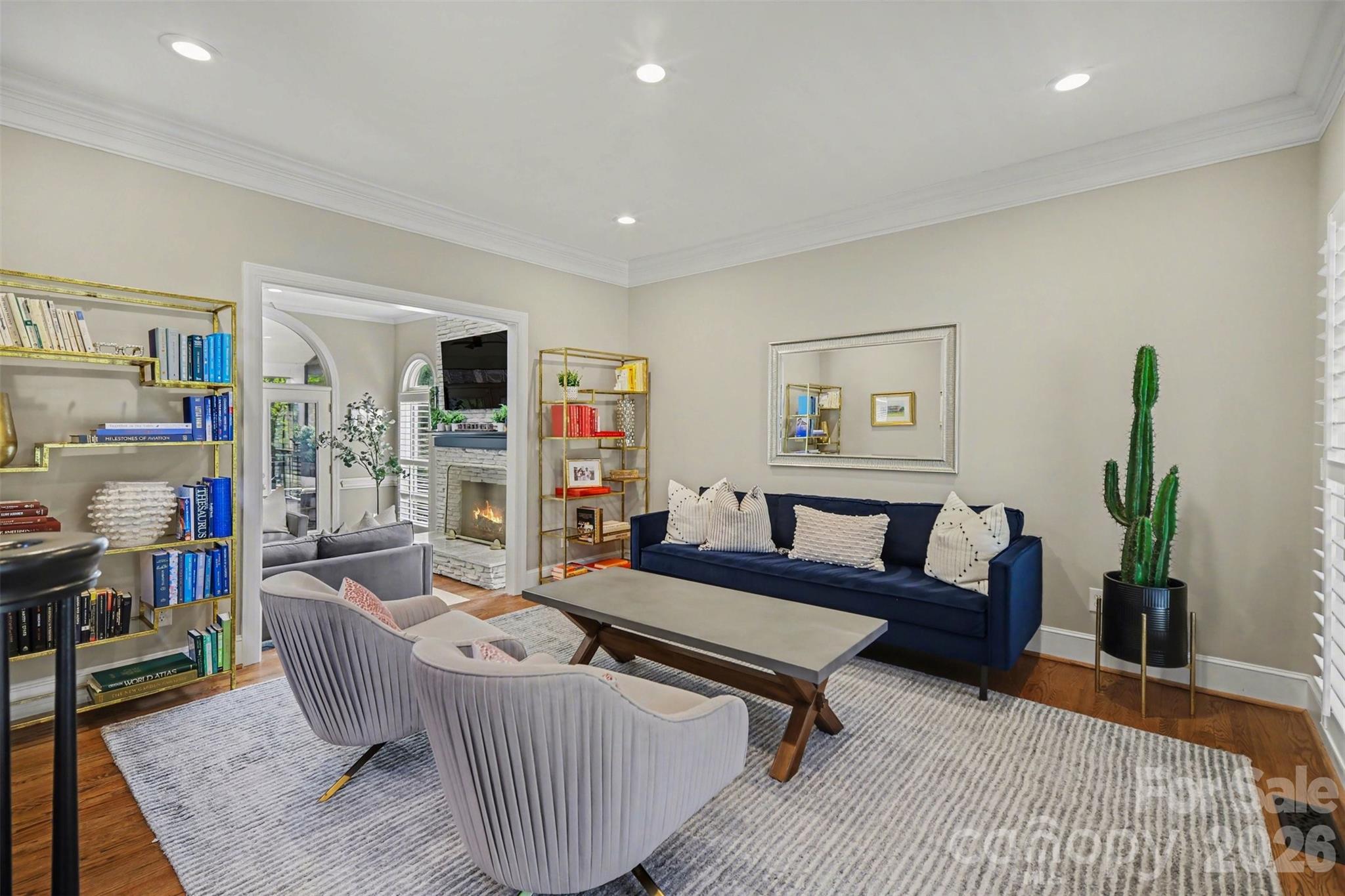 6008 Alexa Road Charlotte, NC 28277 - Photo 3 of 46 a living room with furniture and a wooden floor