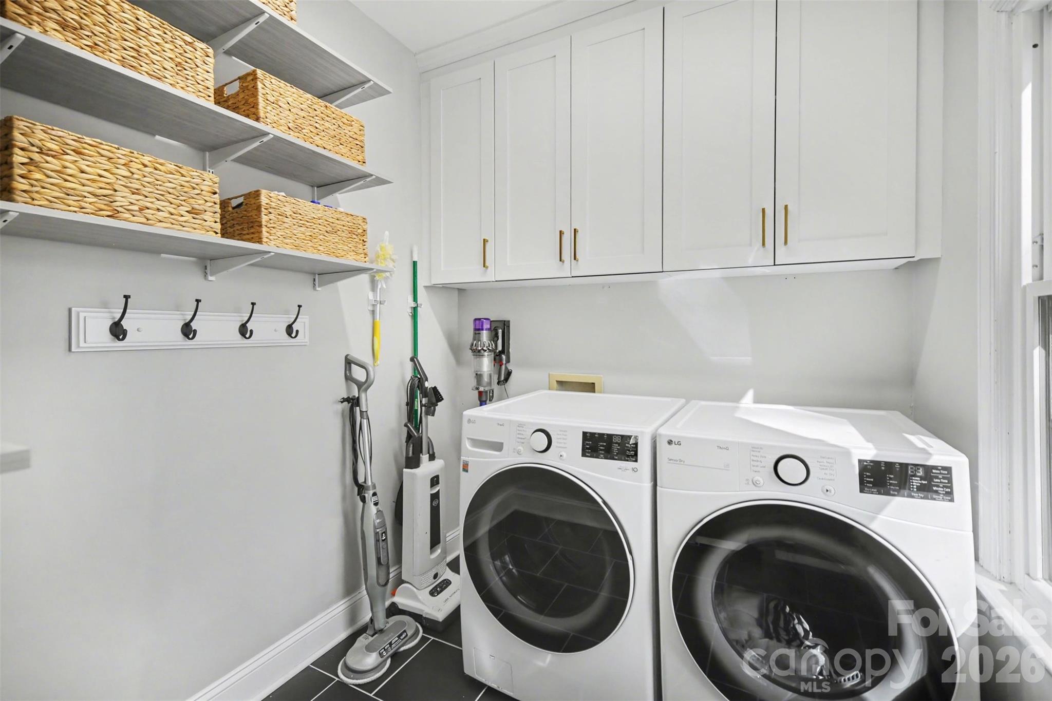 6008 Alexa Road Charlotte, NC 28277 - Photo 40 of 46 a utility room with dryer and washer
