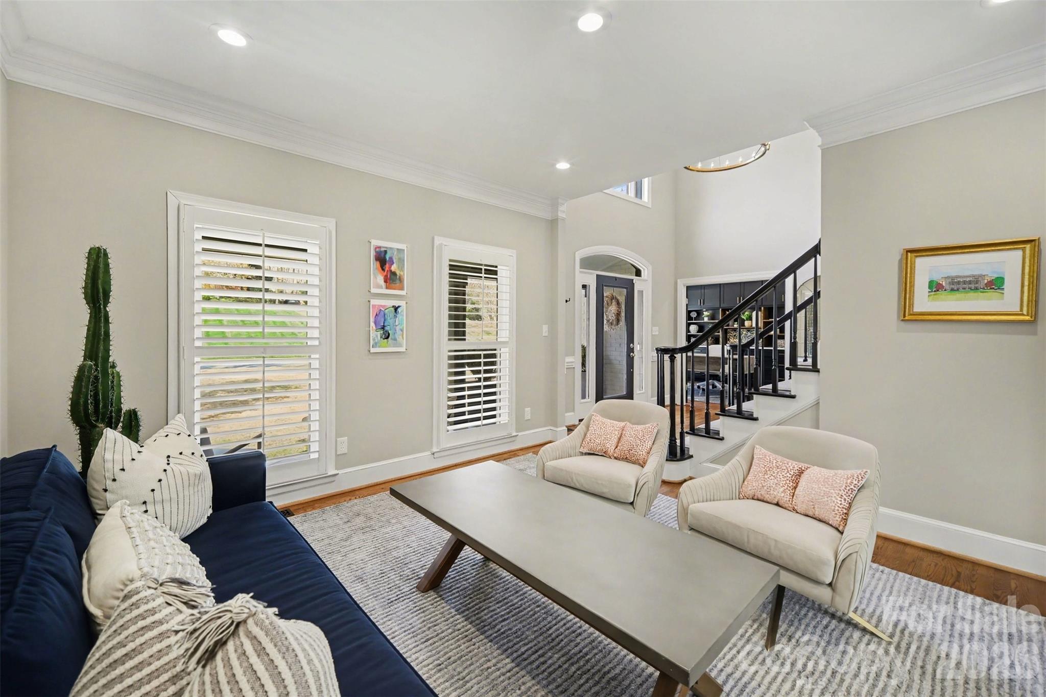 6008 Alexa Road Charlotte, NC 28277 - Photo 4 of 46 a living room with furniture and wooden floor