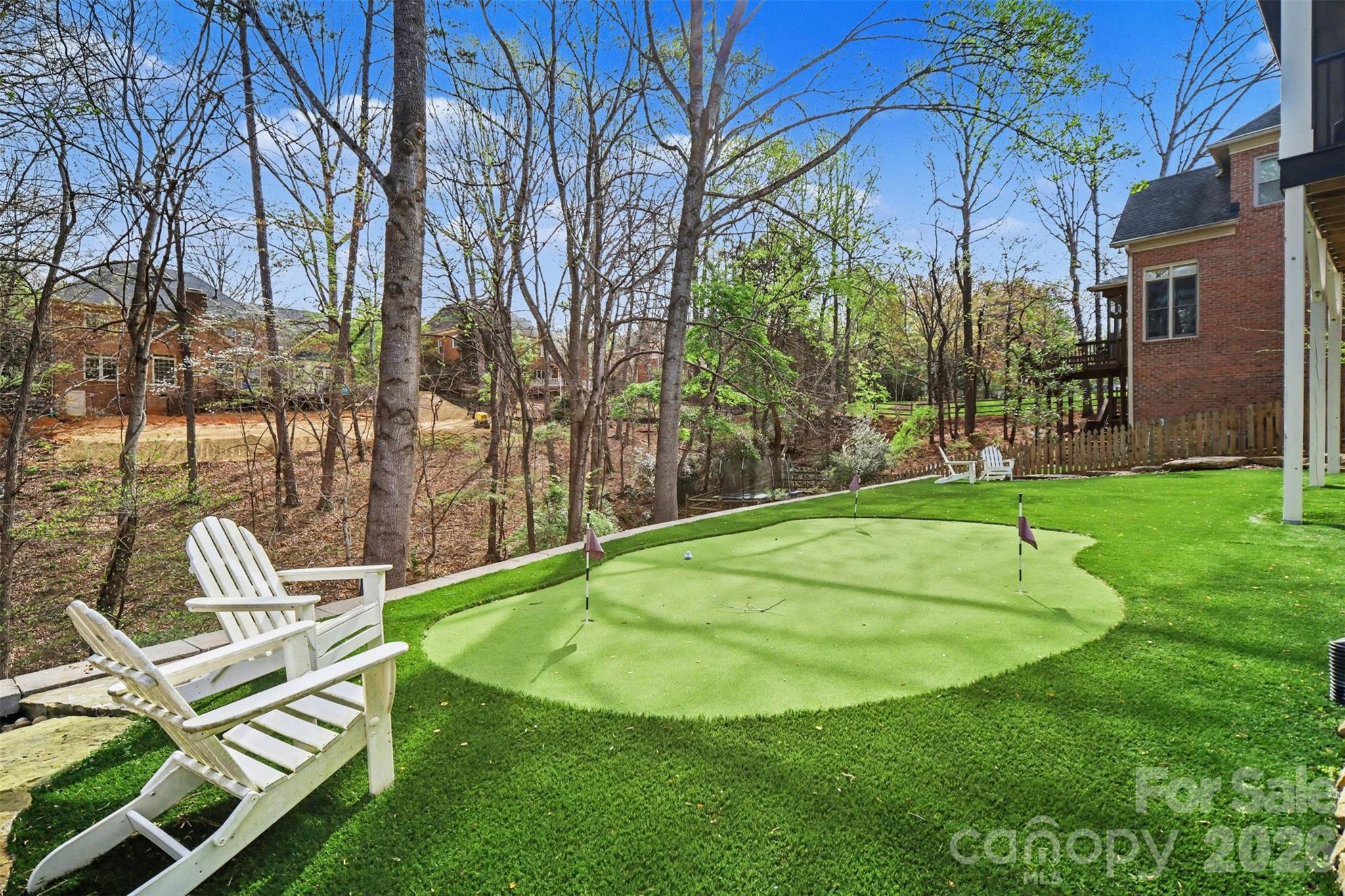 6008 Alexa Road Charlotte, NC 28277 - Photo 42 of 46 a view of a playground with a patio