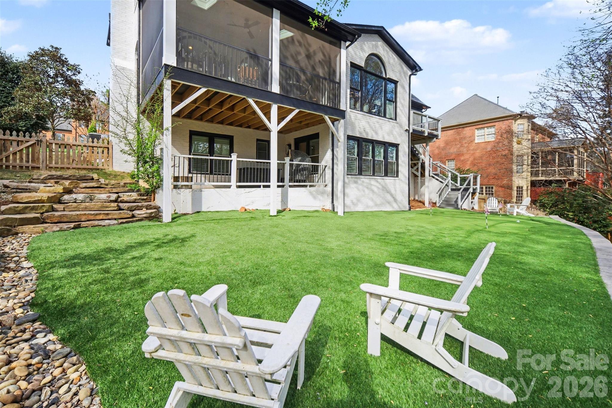 6008 Alexa Road Charlotte, NC 28277 - Photo 44 of 46 a view of a house with a yard and sitting area