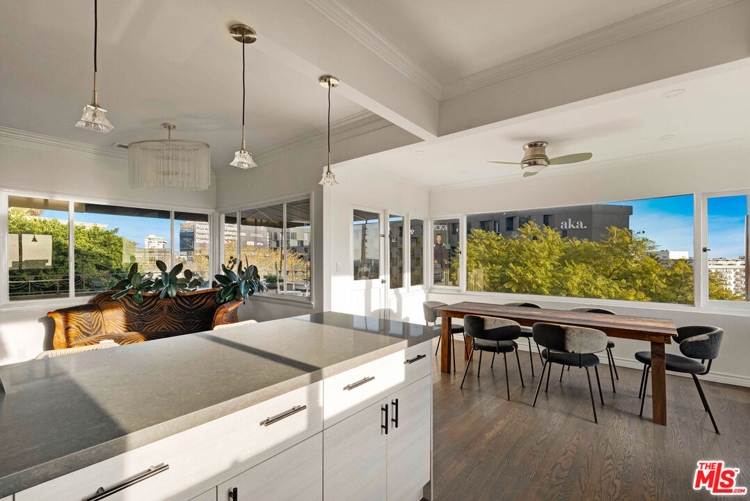 1326 Londonderry View Drive, Unit 7 Los Angeles, CA 90069 - Photo 11 of 21 a view of a dining room with furniture window and outside view