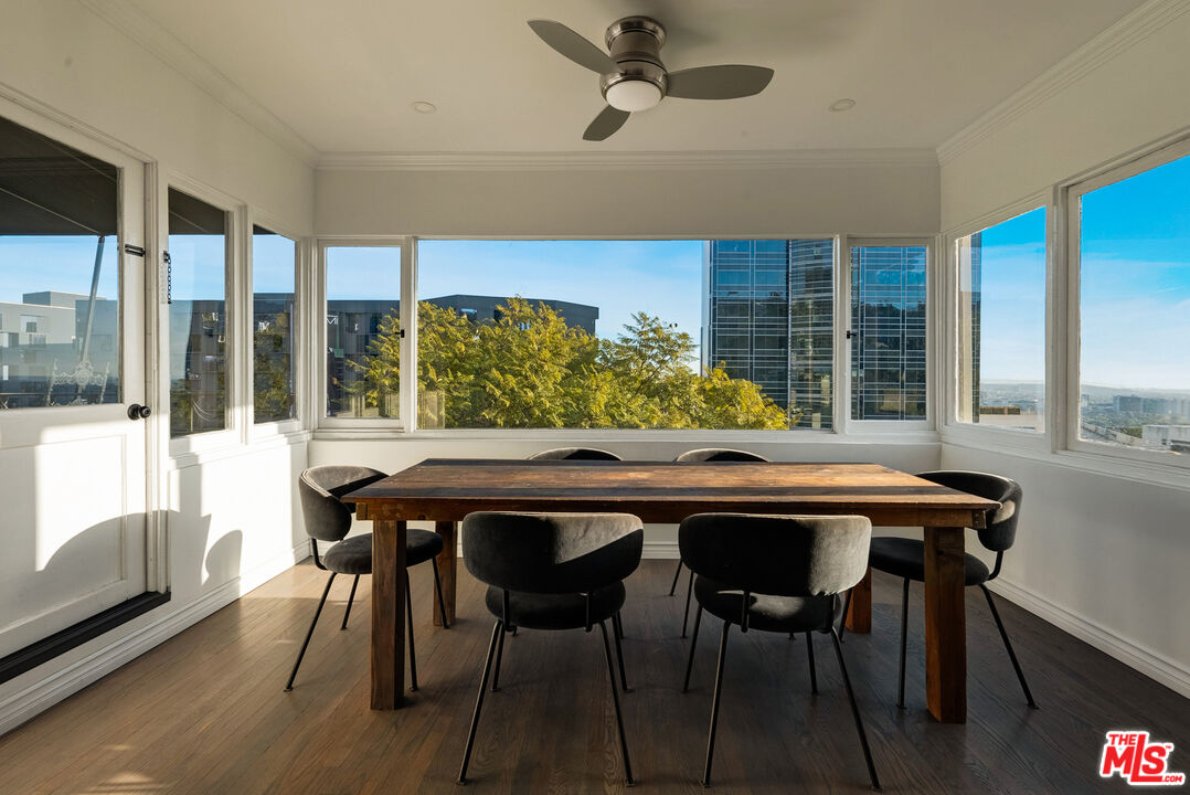 1326 Londonderry View Drive, Unit 7 Los Angeles, CA 90069 - Photo 12 of 21 a dining room with furniture and window