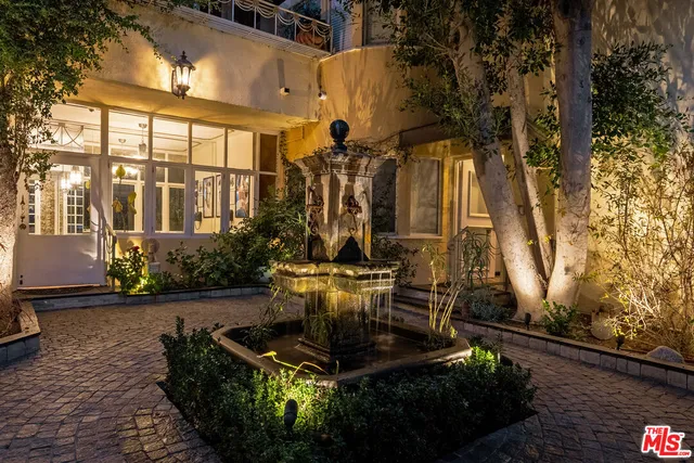 a view of a fountain in the patio with a fountain