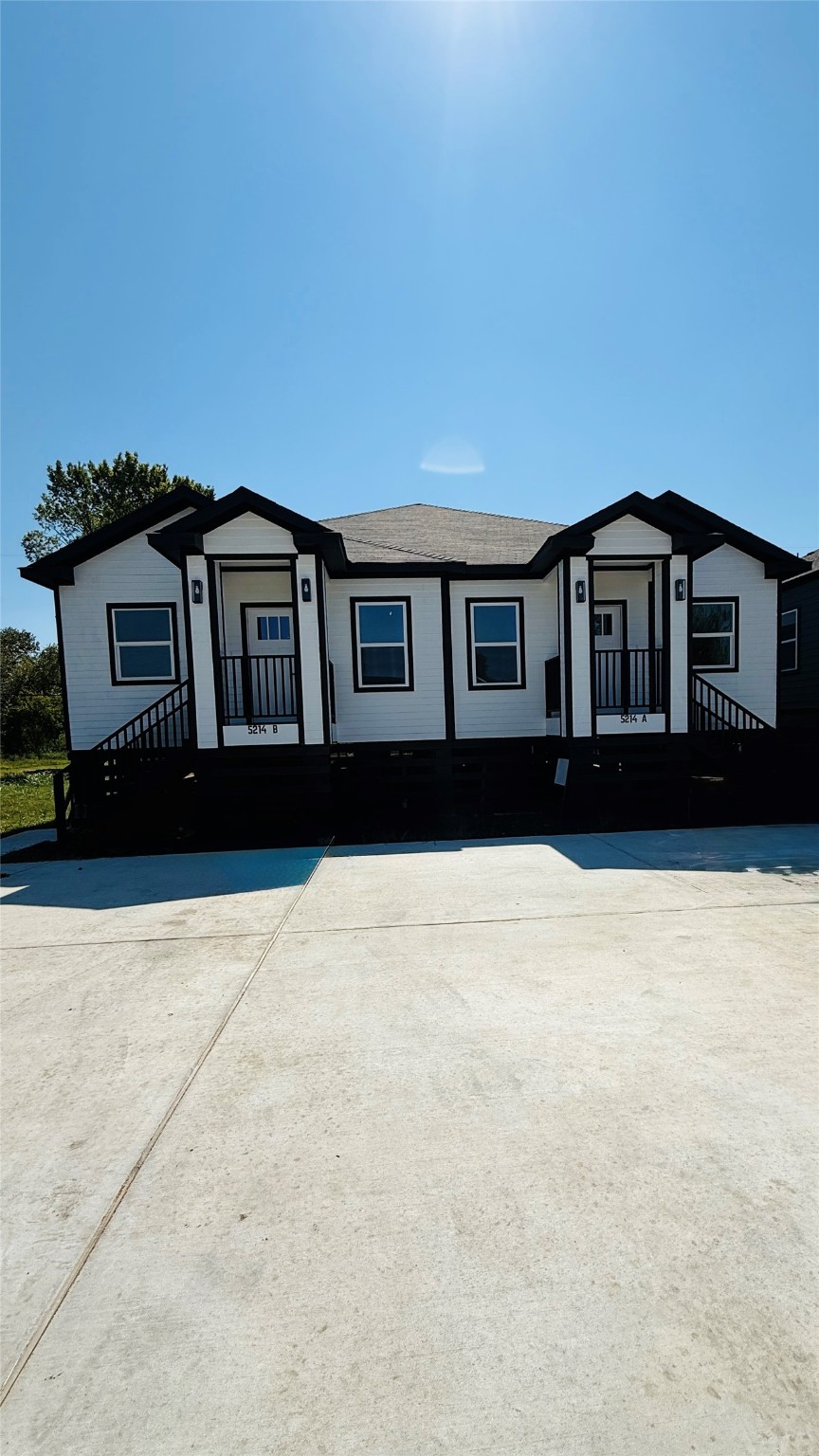 5214 Rue Street, Unit A B Houston, TX 77033 - Photo 13 of 13 a house view with a garden space
