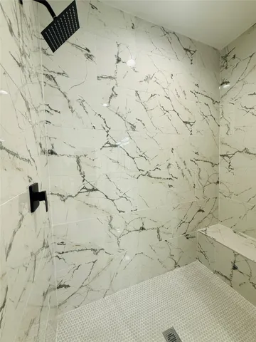 a bathroom with a bathtub