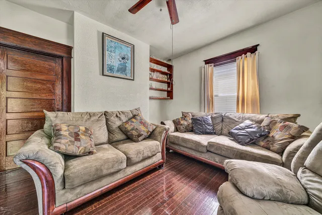 a living room with furniture and a couch