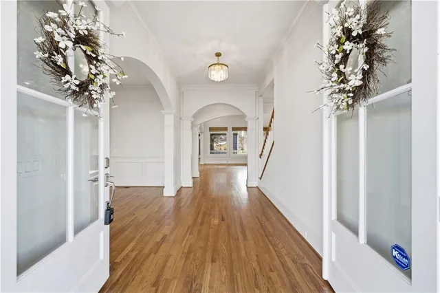 a view of entryway with wooden floor
