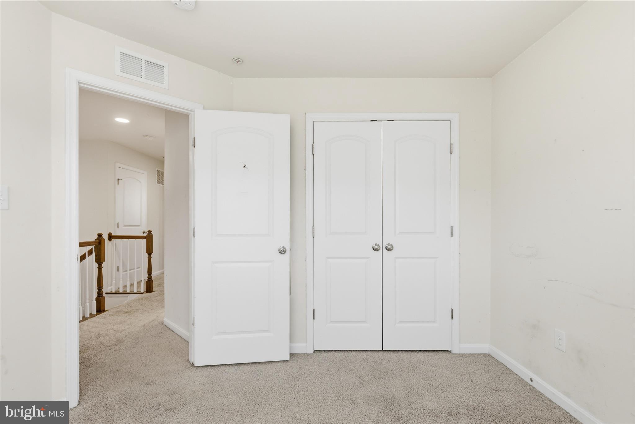 9511 Smithview Place Lanham, MD 20706 - Photo 28 of 33 an empty room with closet area