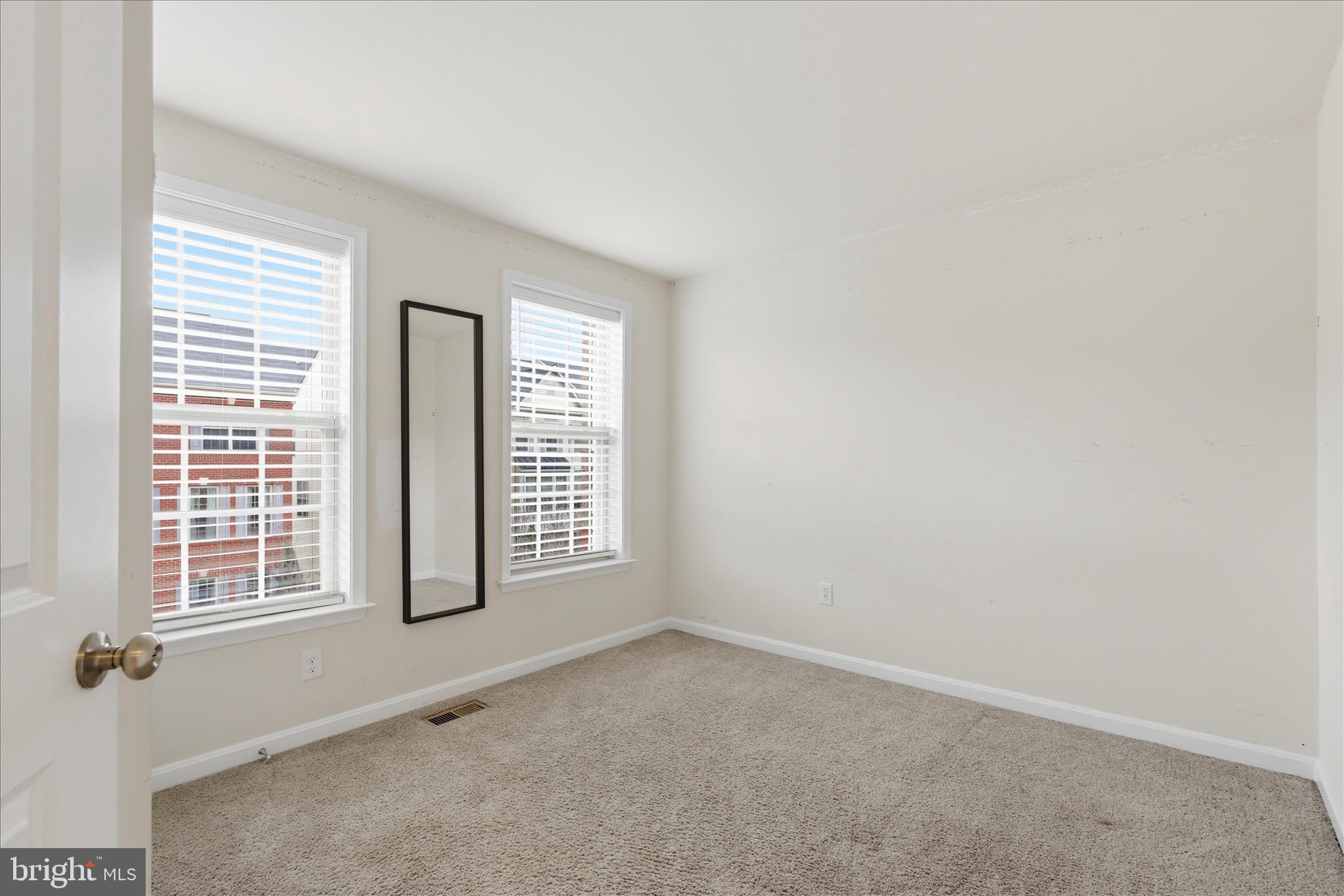9511 Smithview Place Lanham, MD 20706 - Photo 30 of 33 an empty room with windows